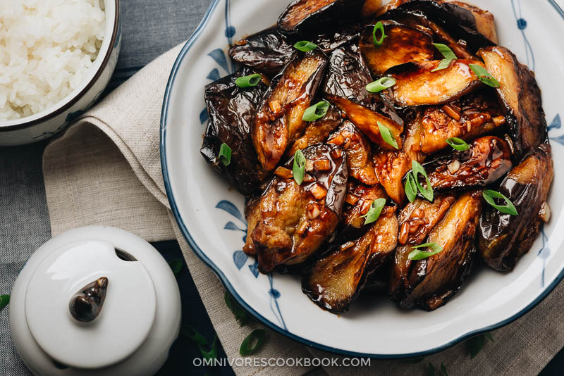 Chinese eggplant with garlic sauce served in plate