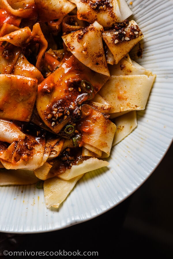 Biang Biang Noodles - With a spoonful of savory seasoned soy sauce and fresh, nutty hot sauce, the thick and meaty handmade noodles will bring you to foodgasm! | omnivorescookbook.com