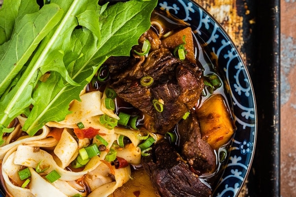 Chinese Beef Noodle Soup (红烧牛肉面) - A very rich noodle soup topped with tender and luscious beef. This recipe shows you how to achieve a truly rich flavor with the fewest steps. | omnivorescookbook.com