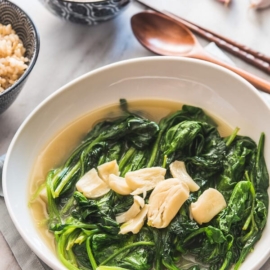 Garlic Spinach in Chicken Broth (上汤菠菜) - The tender spinach is served in a rich and garlicky broth. Originally a restaurant dish, now you can easily make it at home to add delicious leafy greens to your dinner.