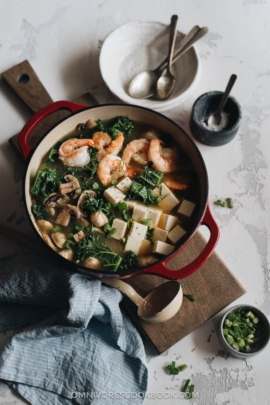 A big pot of shrimp soup with tofu and kale