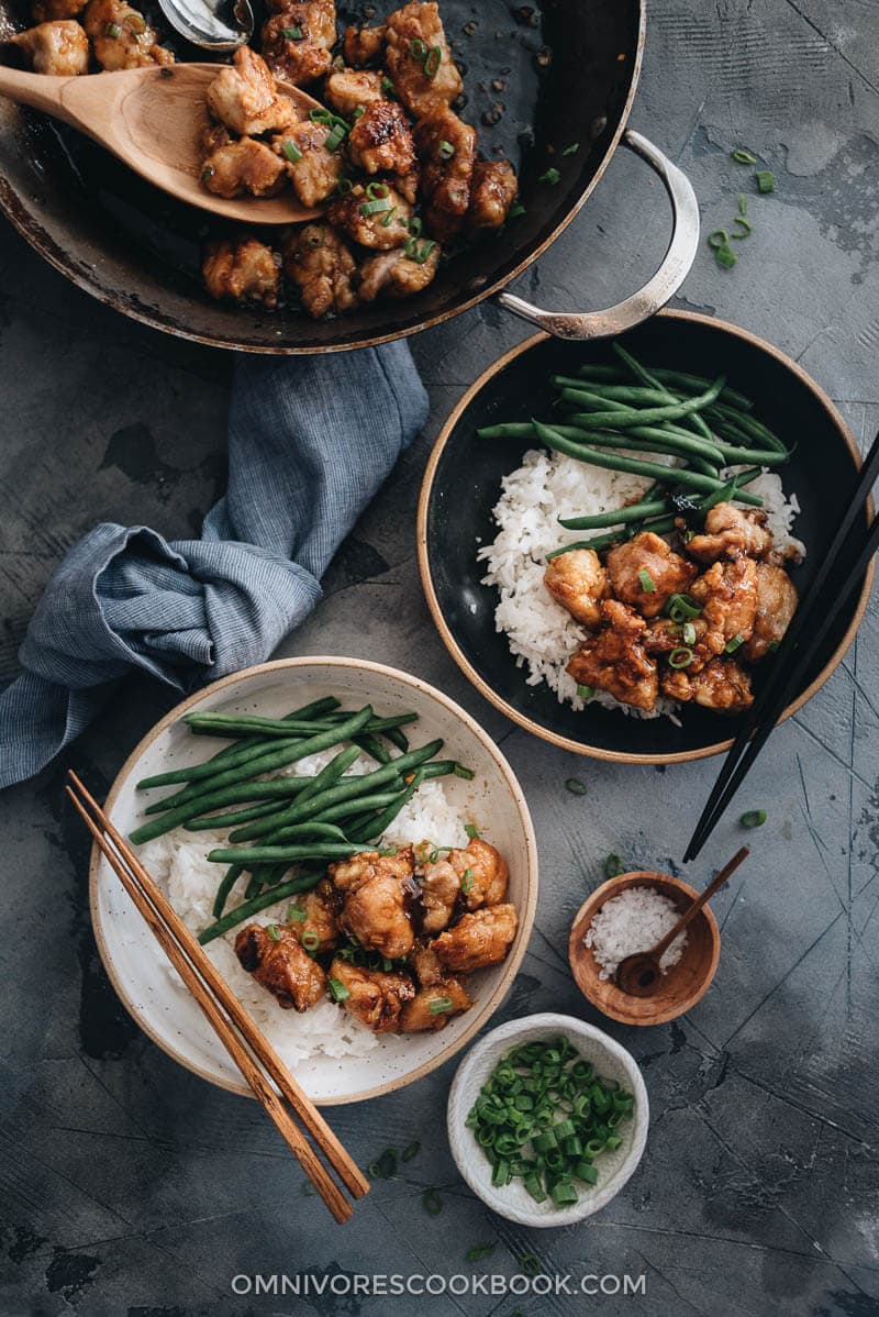 Homemade crispy Chinese honey chicken served in bowls