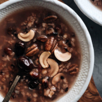 Eight Treasure Congee - Made with whole grains, nuts, and dried fruits, it’s nutritious, comforting, and easy to make. It’s a perfect side for a weekday dinner and it tastes as good as a dessert. Both stovetop and Instant Pot versions are included. #glutenfree #vegan