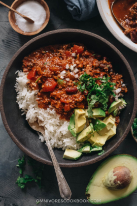 Chinese served over steamed rice with avocado and cilantro