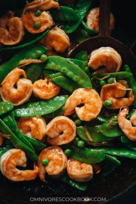 Stir fried shrimp with snow peas close up