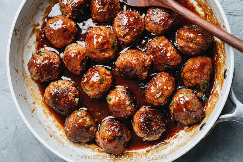 Sticky, juicy meatballs in a skillet
