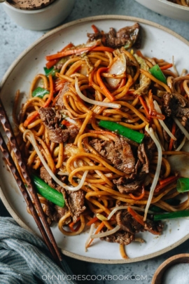 Authentic takeout-style beef lo mein with green onion