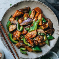Perfectly charred and crispy potato, eggplant, and pepper stirred with a savory garlicky sticky sauce. A simple veggie dish that makes a satisfying dinner served with a bowl of rice! {Vegan, Gluten-Free Adaptable}