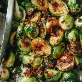 The Brussels sprouts are roasted in the oven until golden and crispy and served with a sweet and sour plum sauce. The dish is so flavorful that it totally stands on its own as a main dish. {Gluten-Free adaptable, Vegan}