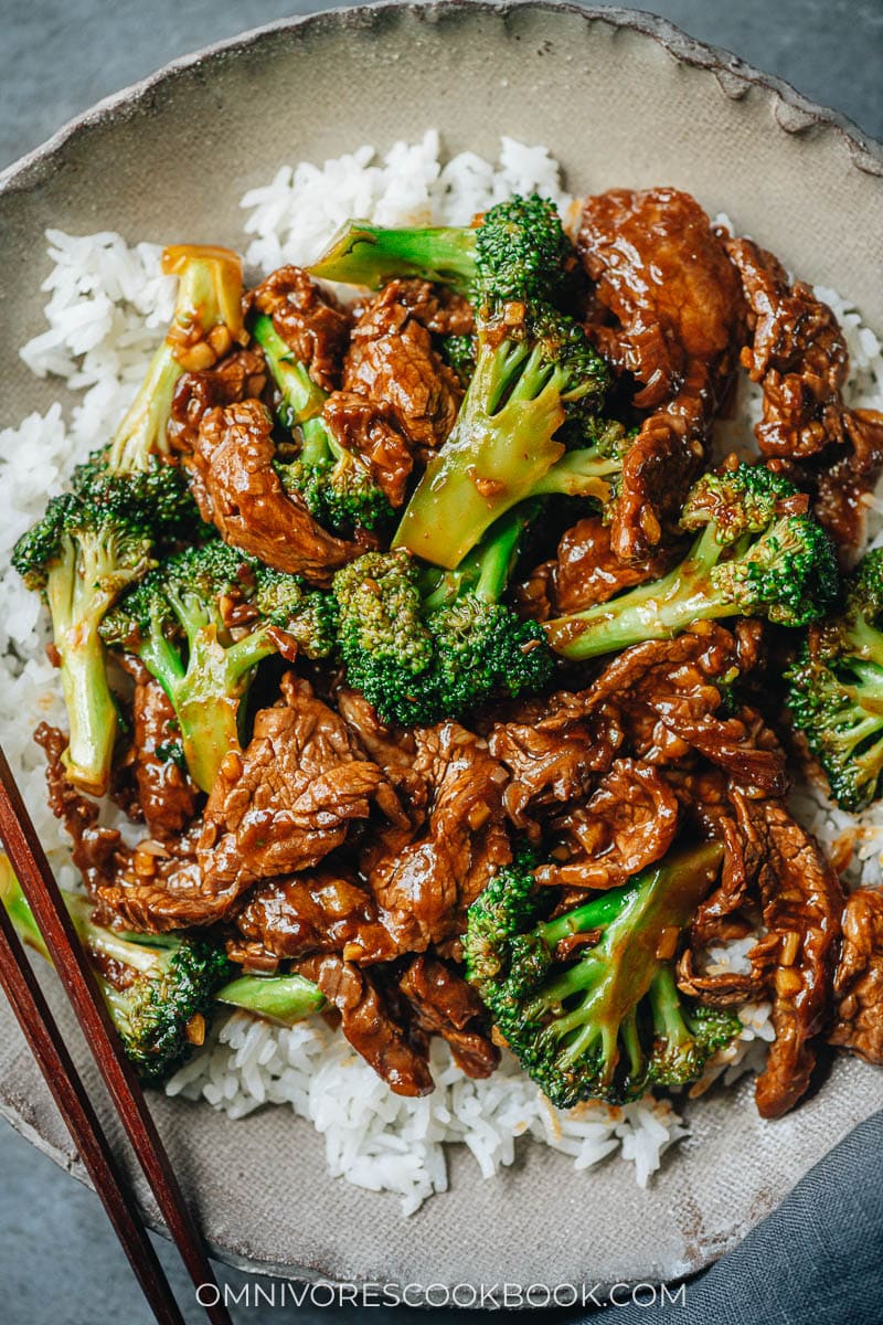 Beef and broccoli served over rice close up