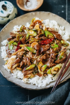 Northern Chinese style scallion beef stir fry over rice