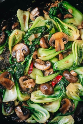 Baby bok choy and mushroom stir fry close up