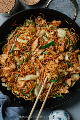 Chicken chow mein in a pan close up