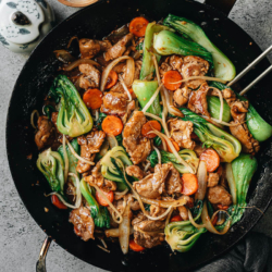 This easy pork chop suey recipe guarantees tender juicy pork slices and crisp crunchy vegetables covered with a rich brown sauce that is well balanced. It is a perfect dish to use up your vegetable scraps from the fridge and make an inexpensive and delicious meal in under 30 minutes. {Gluten-Free Adaptable}