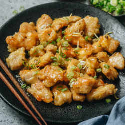 Chinese lemon chicken features crispy juicy chicken covered in a tangy and sweet lemony sauce that is also gingery. Make this easy dish for dinner to enjoy a treat that tastes just as good as the Chinese restaurant version! {Gluten-Free Adaptable}